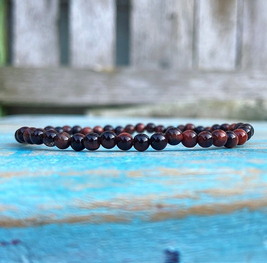 Rode Tijgeroog armbandje "Weet wat je waard bent"