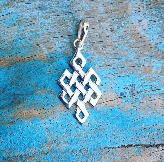 Silver pendant "Samsara, the Infinite Knot"