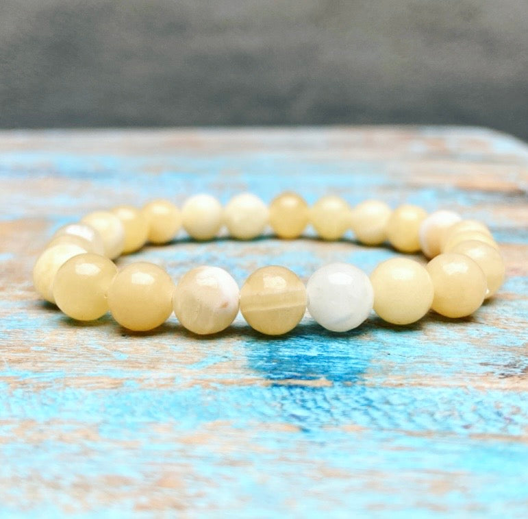 Gele Calciet armband "Lichtheid, helderheid en persoonlijke kracht"