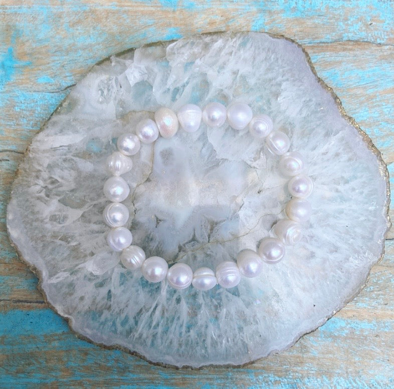Armband witte potato parels "Moeiteloze Kracht"