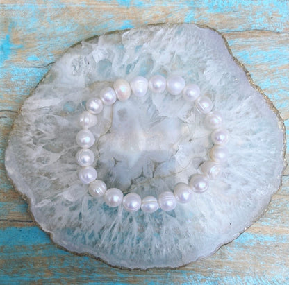 Armband witte potato parels "Moeiteloze Kracht"