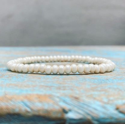 Parel armbandje "Moeiteloze Kracht"