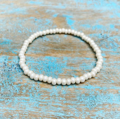 Parel armbandje "Moeiteloze Kracht"