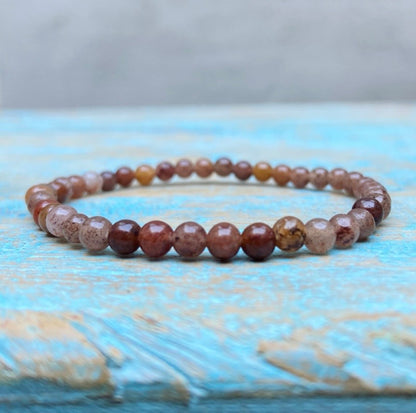 Aardbeienkwarts armband "hartstocht en levenslust"