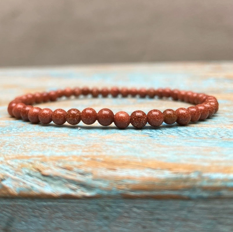 Rode Goudsteen armband "Het vuur in jezelf"