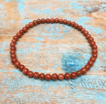 Rode Goudsteen armband "Het vuur in jezelf"