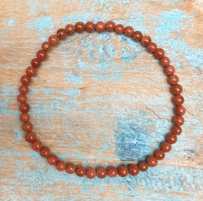 Rode Goudsteen armband "Het vuur in jezelf"