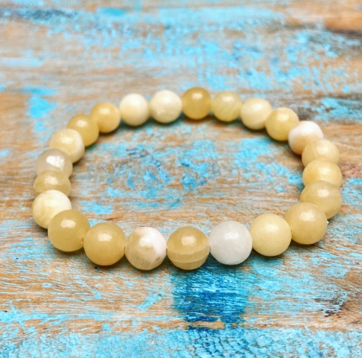 Gele Calciet armband "Lichtheid, helderheid en persoonlijke kracht"