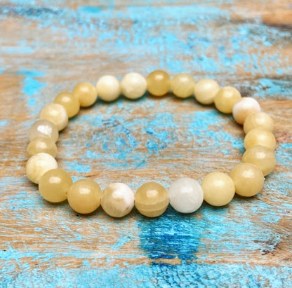 Gele Calciet armband "Lichtheid, helderheid en persoonlijke kracht"