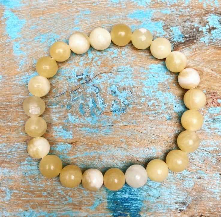 Gele Calciet armband "Lichtheid, helderheid en persoonlijke kracht"
