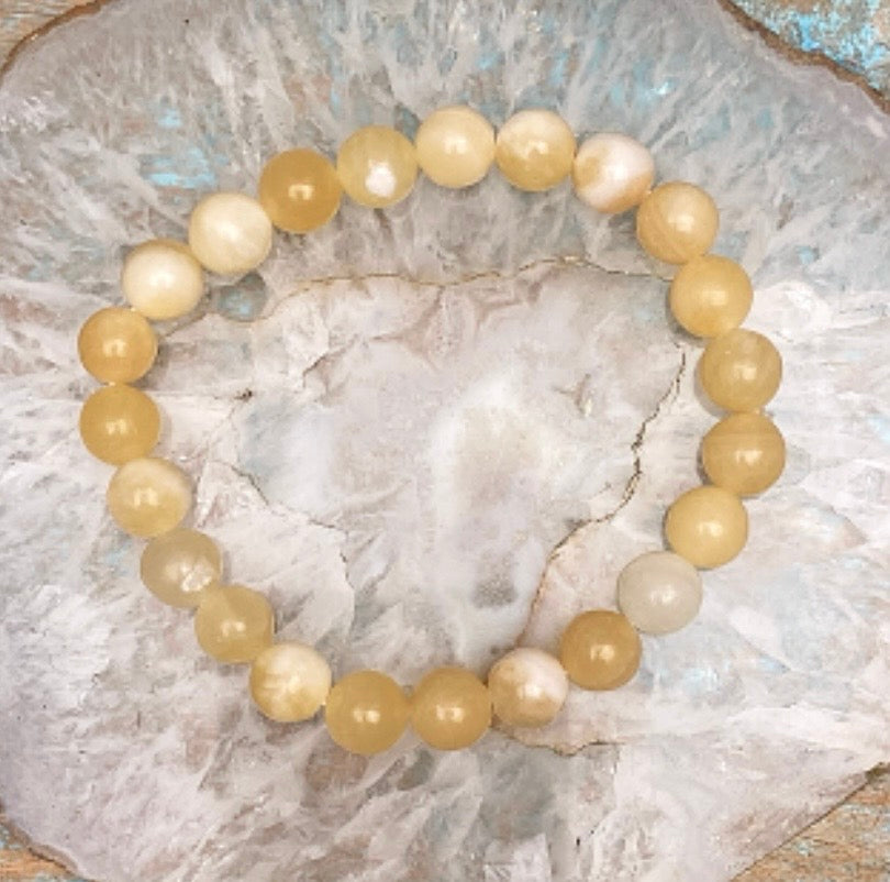 Gele Calciet armband "Lichtheid, helderheid en persoonlijke kracht"