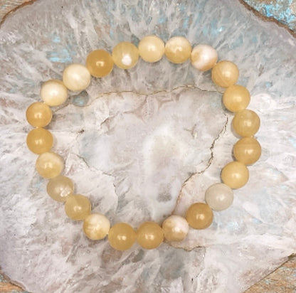 Gele Calciet armband "Lichtheid, helderheid en persoonlijke kracht"