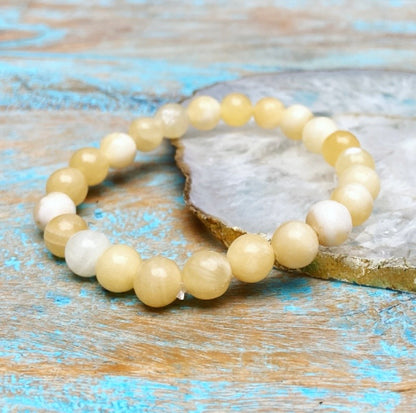 Gele Calciet armband "Lichtheid, helderheid en persoonlijke kracht"