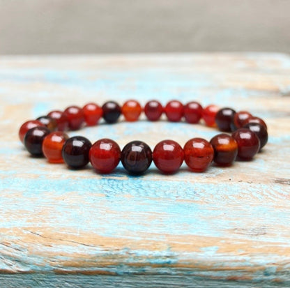 Rood-oranje Agaat armband "Het vuur blijft branden"