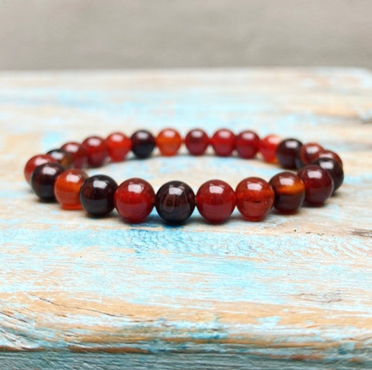 Rood-oranje Agaat armband "Het vuur blijft branden"