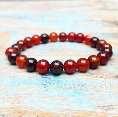 Rood-oranje Agaat armband "Het vuur blijft branden"