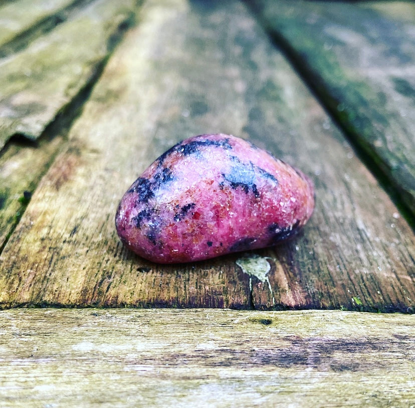 Rhodonite tumbled stone "First Aid for Discomfort"