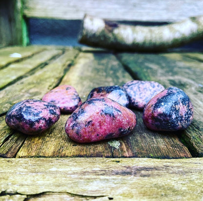 Rhodonite tumbled stone "First Aid for Discomfort"