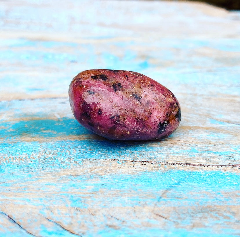 Rhodonite tumbled stone "First Aid for Discomfort"