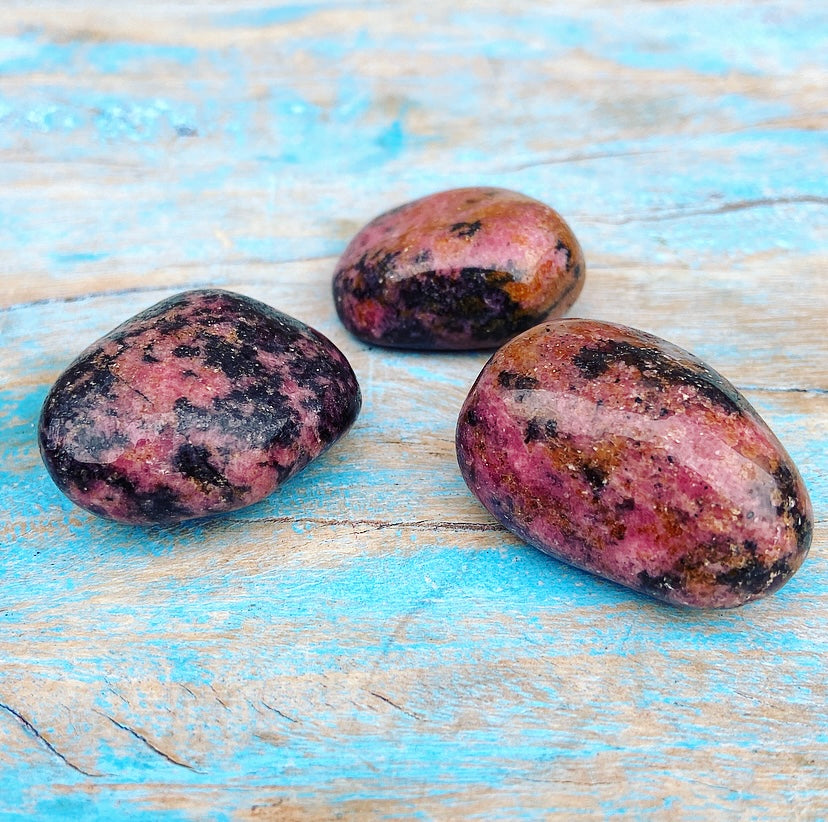 Rhodonite tumbled stone "First Aid for Discomfort"