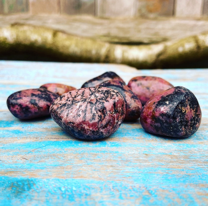 Rhodonite tumbled stone "First Aid for Discomfort"